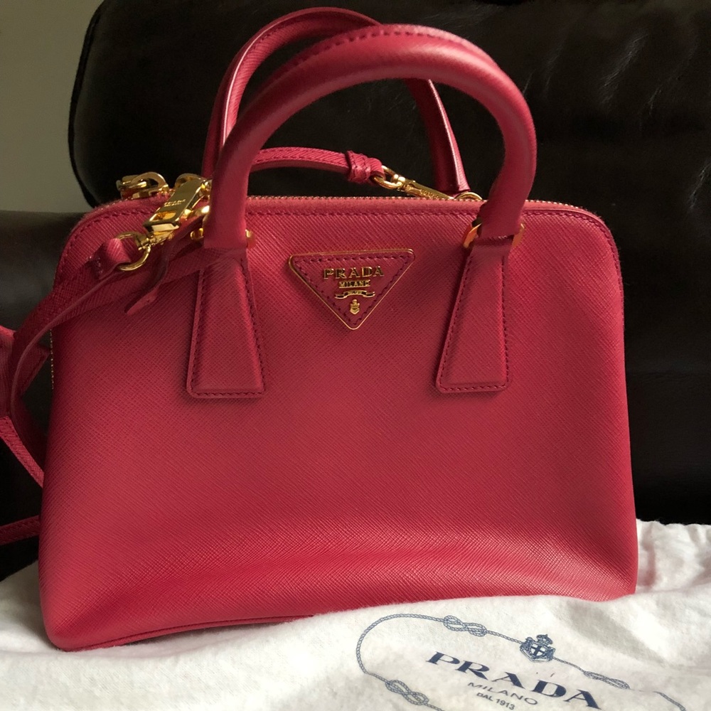 Prada deep pink bag with handles and strap